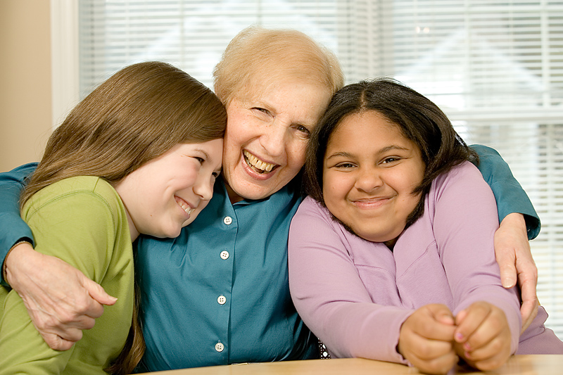Caregiver with two girls