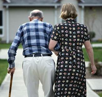 Elderly couple walking